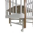 Кроватка детская Indigo Italiano Baby продольный маятник на колесах