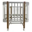 Кроватка детская Indigo Italiano Baby продольный маятник на колесах