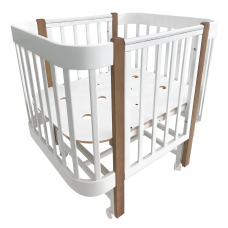 Кроватка детская Indigo Italiano Baby продольный маятник на колесах